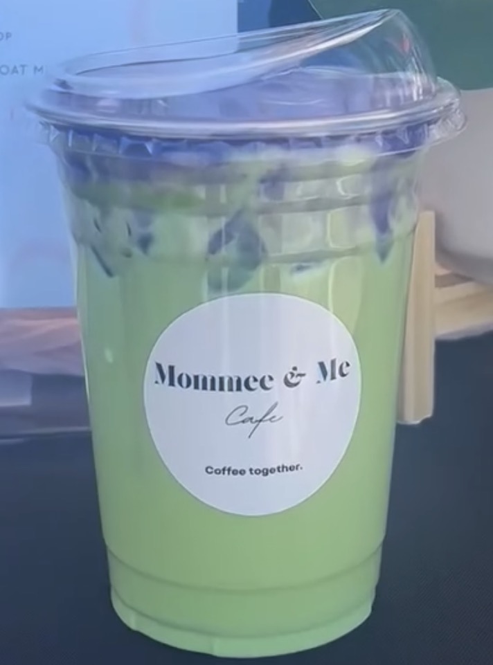 Iced matcha latte in a clear Mommee & Me Cafe cup
